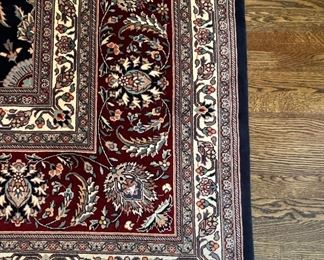 Einstein Moomjy Navy Wool Persian-Style Rug. Measures 11'6" x 14' 6". Photo 4 of 4.