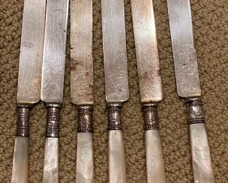 Set of 4 Dinner and 3 Luncheon Knives with Mother of Pearl Handles & Sterling Silver Bezels.