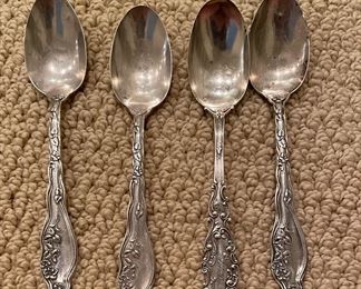Set of 4 Sterling Silver Spoons.