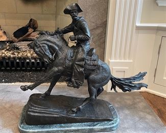 Frederic Remington Reproduction Bronze, "The Cowboy." Measures 19" W x 23" H.