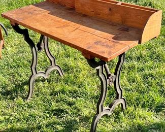 ANTIQUE DRSK WITH CAST IRON BASE 