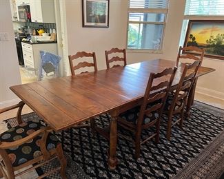 Ethan Allen.  Shown with 2 18” leaves inserted. 108” total length. $1895. 