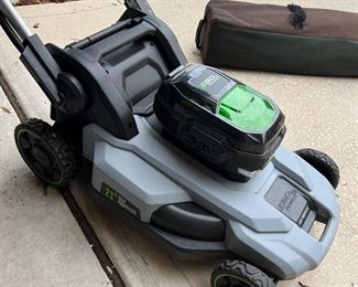 Battery Powered Lawnmower $200 - has battery, charger, manuals.  Works- folds down.  Self Propel wire needs replacement.  
