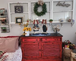 This is the master bedroom. - Love this window panel shelf and Red Sideboard