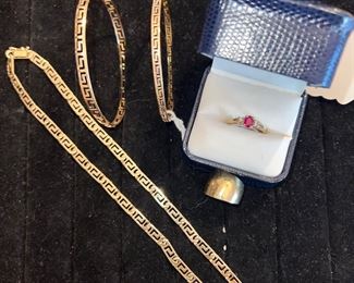 14k bangles , chain, Ruby ring, done ring