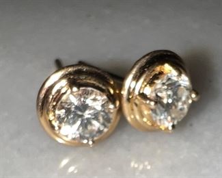 14 k .66 carat TW diamond solitaire earrings. HI color and VS2 clarity.  With appraisal.  