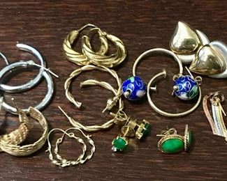 Some of the many pairs of gold earrings