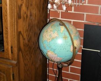 Lighted world globe on stand