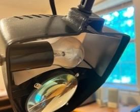 Magnifying loop with light - it clamps to any surface. 