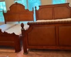 2 king beds. On the left, Grandma's2930's solid maple, and on the right, Haverty's bed (matching mirror dresser, tall dresser, and 2 nightstands)