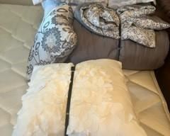 Beautiful white flower themed cushions, queen comforter set with cushion, and a beautiful silvery queen comforter with two matching shams