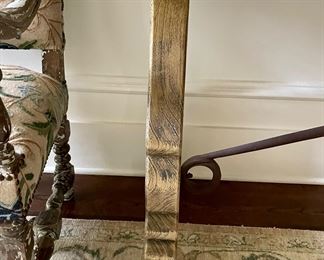 Detail of hall table flanked by pair of chairs