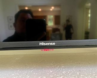 Several up-to-date current style TVs thin profile this is Hisense brand