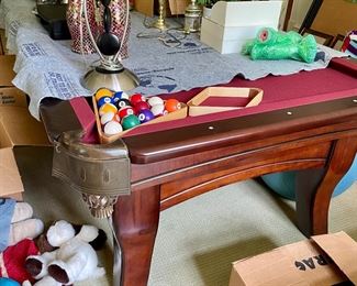 Billiards table--somewhere under all these items :) everything shown is for sale.