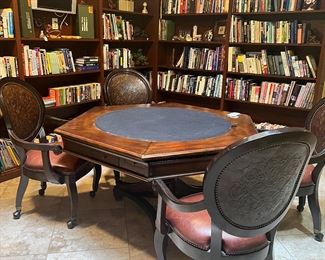 Gorgeous Frontgate game table with four carved wooden chairs.  Has pull outs for drinks, poker chips etc.