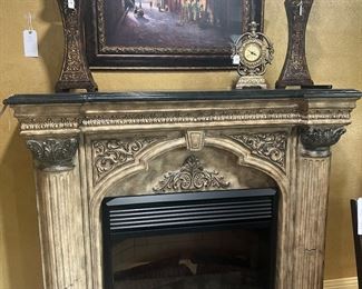 Electric fireplace mantel, candlesticks, art