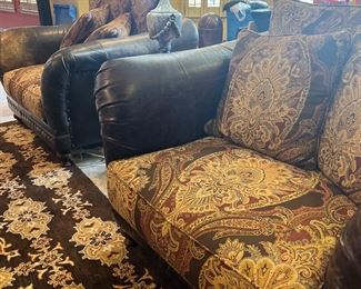 Pair of leather and upholstered chairs