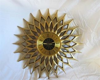 MCM Elgin sunburst wall clock... $225.00