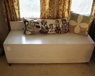 Banquette with storage opens from back