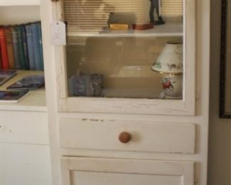 Tall vintage glass cabinet