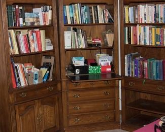 3 sections of lighted bookcases