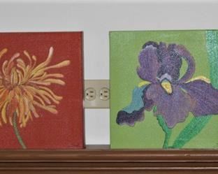 Four painted flowers for hanging