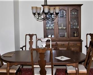 Beautiful Black Walnut dining room suite.  Table has 4 leaves.