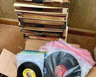 Vintage 78 and 45 records with 78 record albums