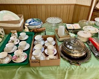 Fine china teacup and saucer sets and serving-ware. 