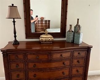 Tommy Bahama Bedroom Set $5,000. Includes Dresser, Mirror, Tall Boy Chest, 2 Nightstands, Head board, Foot Board and Side rails 