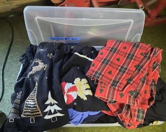 A whole tote of ugly Christmas sweaters, vest & shirts. 20+