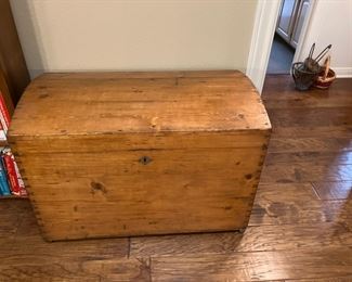 Antique pine round top trunk. 