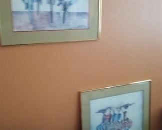 2 matted and framed pictures