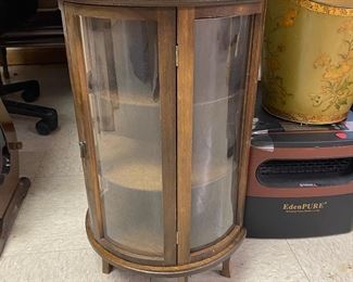 P65 - $25 Small Curved Glass Display Case