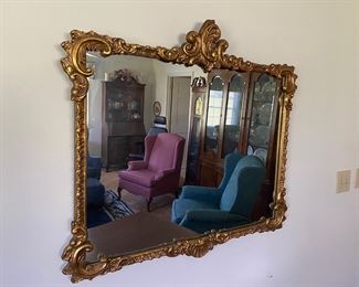 H201  - $100. Ornate Mirror measures 39" wide x 34" tall. 