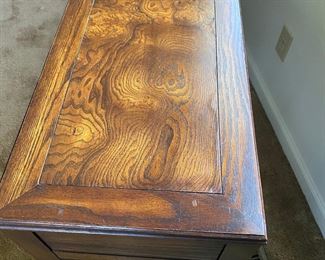 H3 - Campaign Style Sofa Table. Measures 52" long x 14" deep x 26.5" tall. 