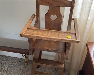 H143 - $8 small wooden highchair. 