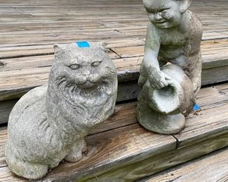 H147 - Large Concrete Cat Statue $30. Cherub Statue $30. 