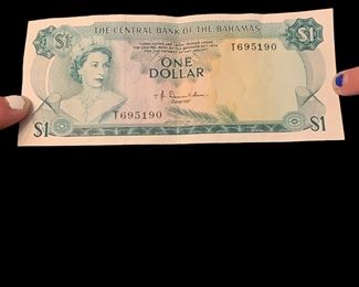 C14 - $8 - set of 8 Canadian $1 bills. 