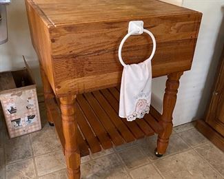 H63 - $125 Butcher Block Table. Measures 33" tall x 24" square block. (Block is not solid - it is hollow in the middle)