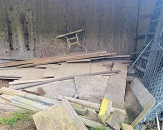 S56 - Large Pile of covered lumber. Make an offer on the lot or we can sell by the board. 