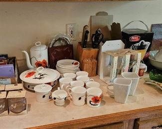 Kitchen items: wine glass sets, Coffee/desert set, knives in block, pitcher and bowl (items sold separately)