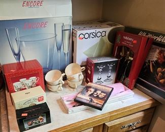 More kitchen items: Corsica dish sets, wine glasses, wheat pattern coffee cups (set, cnadle sticks (items sold separately)