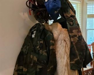 Camouflage costs, fake fur coat, trucker caps, coat tree (items sold separately)