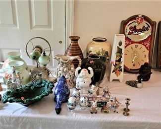 Stroh's beer signs, pottery items, salt & pepper shaker sets, vintage lamps (items sold separately)