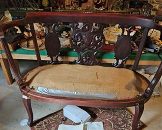 Carved wood bench, small rug and all the stuff in the background (items sold separately)