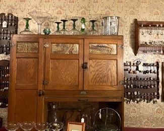 Large souvenir spoon collection as well as display racks (sold separately)