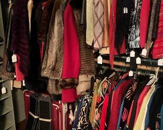 Furs and Allure jackets - just some of the extensive clothes collection for sale in two closets as well as four standing racks