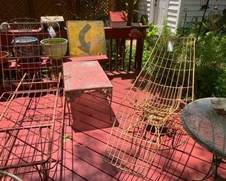 Metal lounge chairs - yellow one swivels