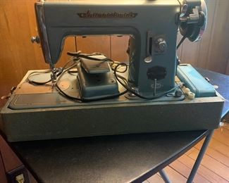 40 pounds of sewing machine.